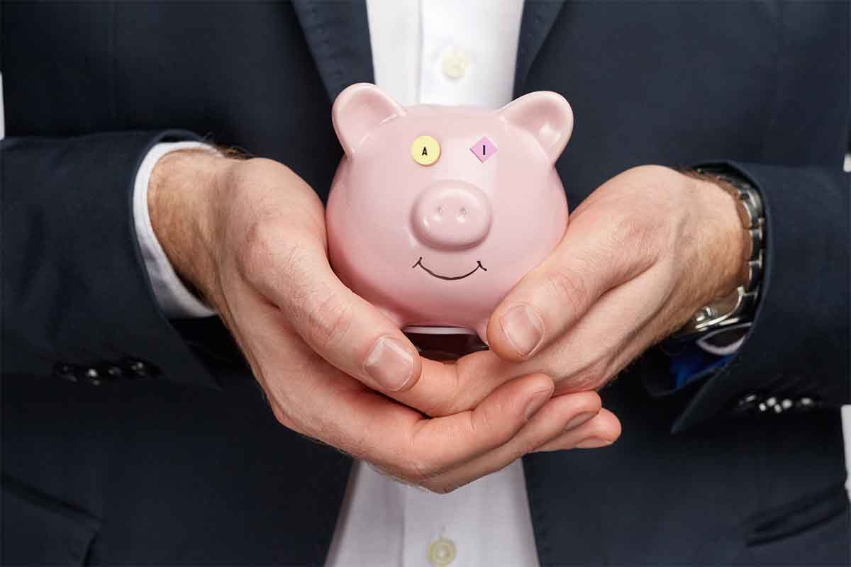 Photo illustration of a piggybank with a person in a suit.